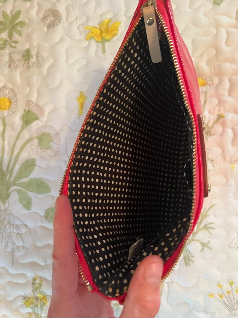 kate spade red travel pouch with gold logo plate